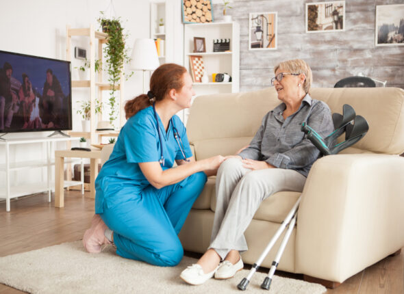 Young female nurse wearing blue uniform