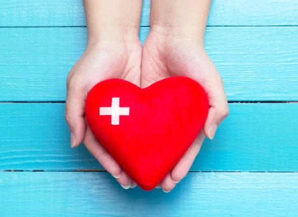 hand holding love with a plus sign