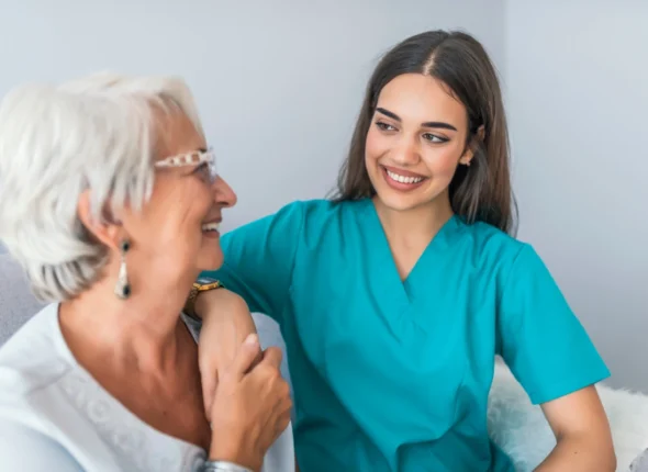 smiling female Carer with senior